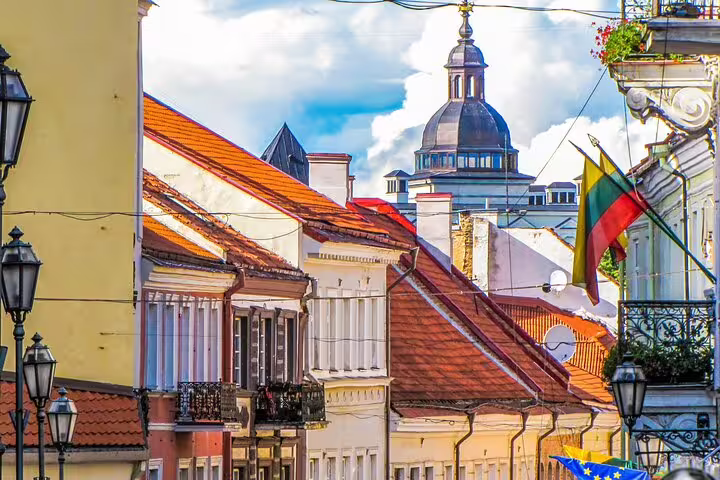 Vilnius Old Town rooftops and church dome, scenic stop on a self-guided scavenger hunt highlights tour