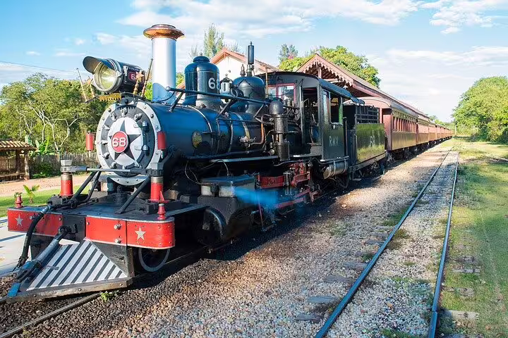 Vintage steam train on the Gold Route in Minas Gerais, showcasing Brazilian heritage and scenic rail journeys.