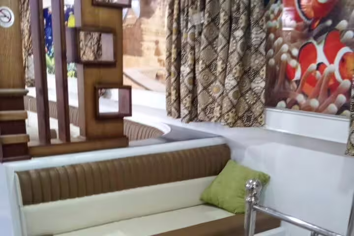 Comfortable seating area on VIP boat for Sataya Reef dolphin snorkeling tour from Marsa Alam marina