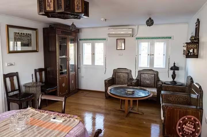 Traditional lounge on VIP Dahabiya Nile cruise from Luxor to Aswan 5 days with seating and river views