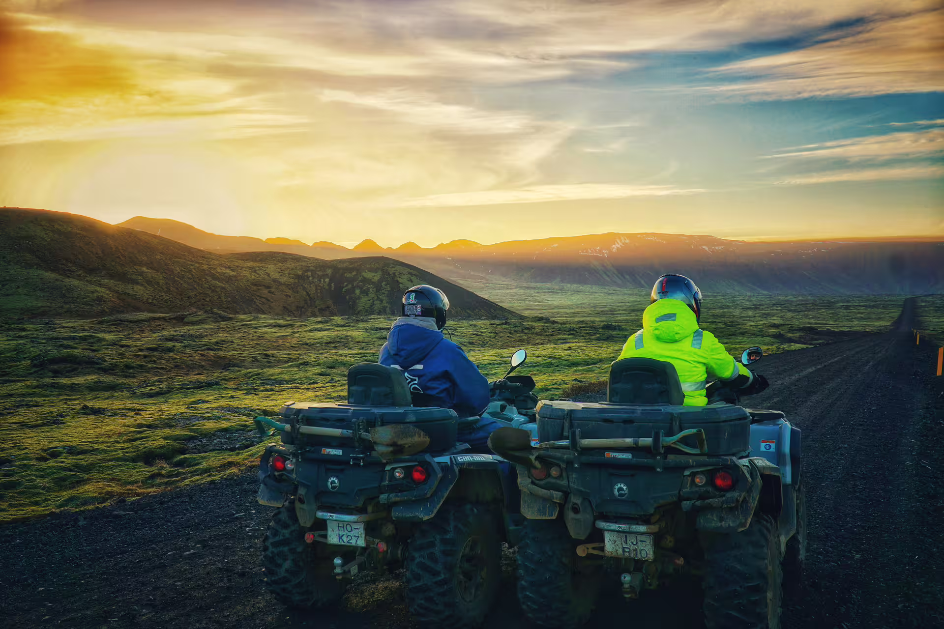 Two adventurers on ATVs explore volcanic landscapes at sunset during a 3-hour guided tour of the springs.