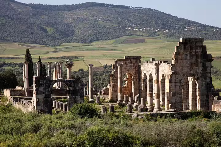 Volubilis Roman ruins near Meknes, historic stop on private 6-day desert tour from Casablanca to Marrakech