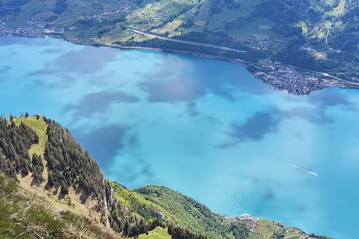 Turquoise Walensee lake view from Leistkamm Ridge on a guided Zurich hiking day trip in the Swiss Alps
