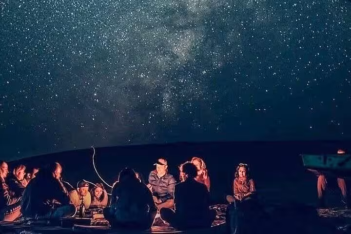 Stargazing campfire in Egypt’s White Desert under the Milky Way, overnight on a 2-day private White & Black Desert tour