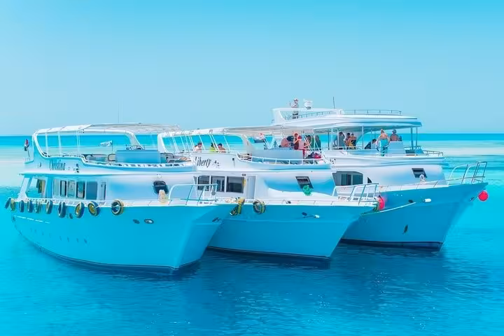White Island and Ras Mohammed boat trip from Sharm El Sheikh, twin yachts on turquoise Red Sea waters