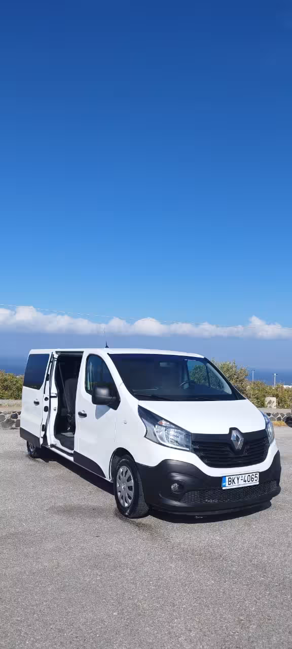 White passenger van for private transfer service with sliding door open, ideal for airport pickup and tours