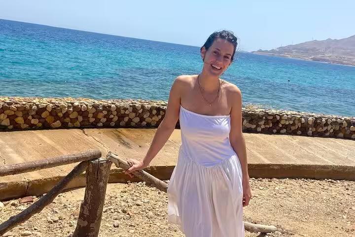 Woman by the turquoise Red Sea in Ain El Sokhna, relaxing on a Cairo to Sokhna day trip beach tour