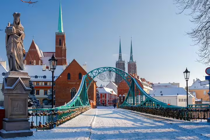 Winter view of Wroclaw Tumski Bridge and cathedral spires, ideal for a self-guided scavenger hunt tour