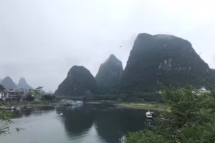 Scenic view of Yangshuo's karst mountains and Li River, perfect for a private day tour biking adventure.