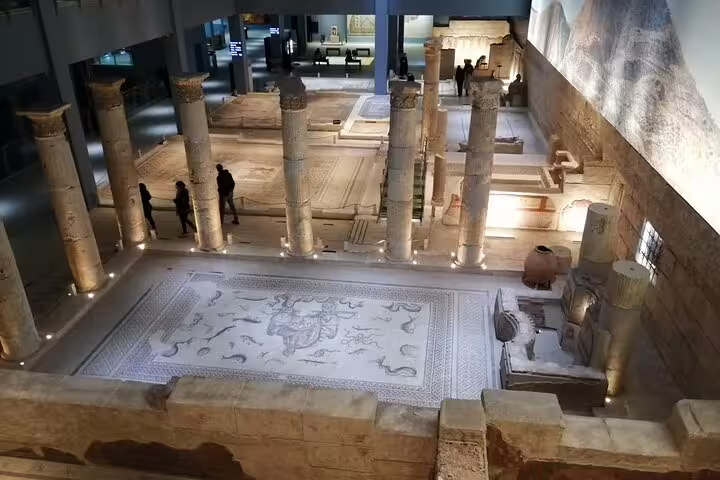 Ancient Roman mosaic and columns at Zeugma Mosaic Museum, a highlight on the 10-day private Turkey tour