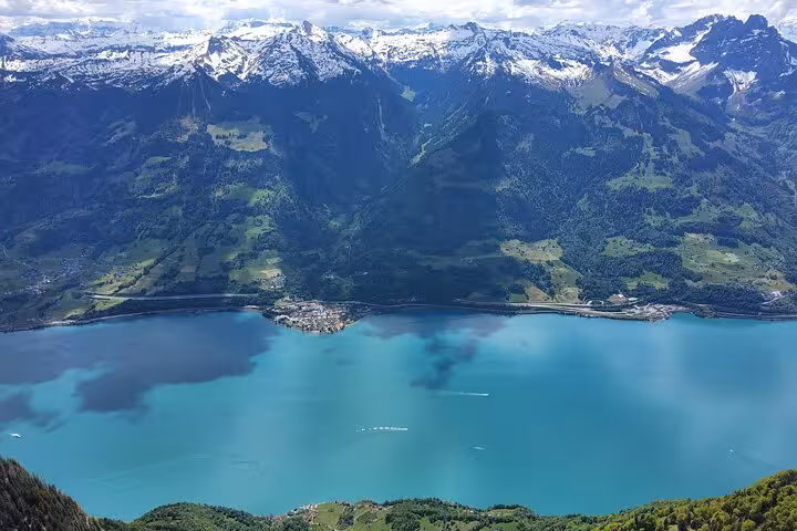 Panoramic view over Walensee and snowcapped Alps on the Zurich guided hike to Leistkamm Ridge