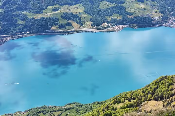 High viewpoint over Walensee and alpine valleys on the Zurich guided hiking day trip along Leistkamm Ridge