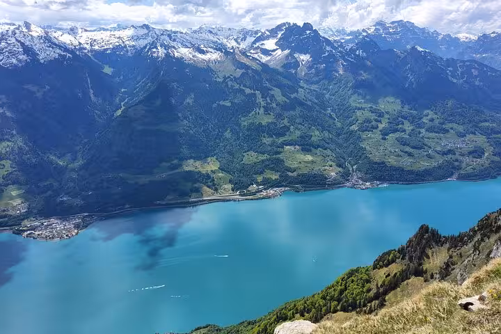 Panoramic Walensee and snowcapped Alps view on Zurich guided hike along Leistkamm Ridge trail