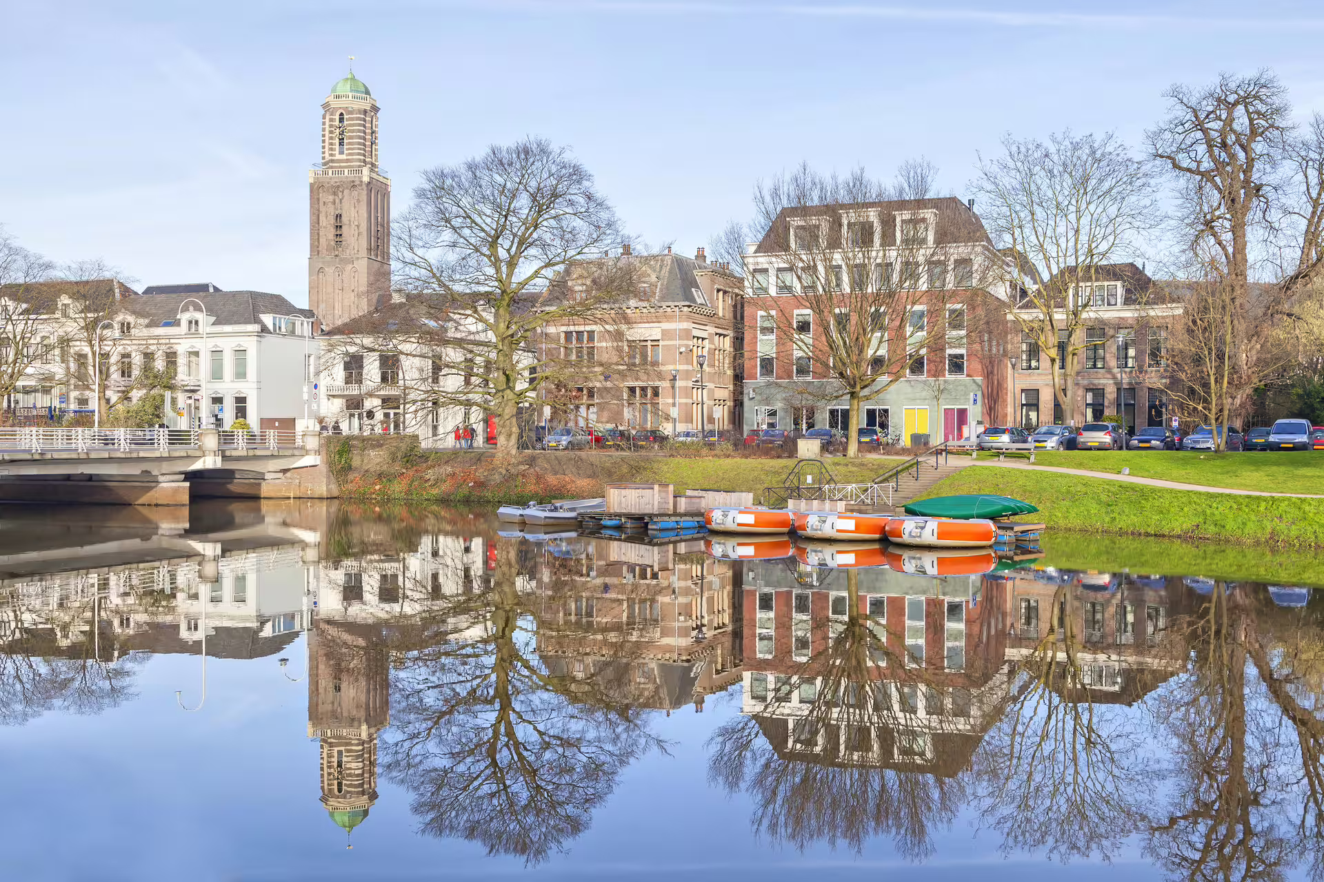 Scenic canal view in Zwolle with Peperbus tower reflection, ideal for a 1-day walking tour audioguide.