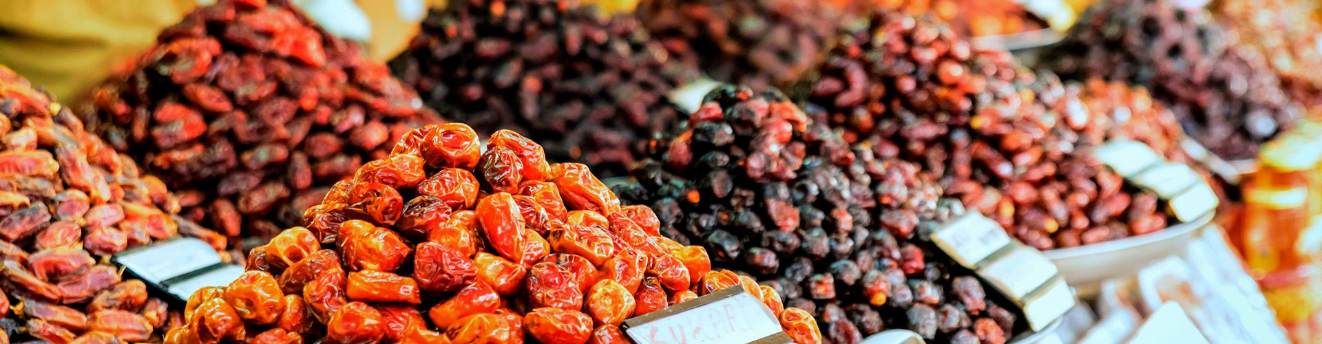 Abu Dhabi's Date Market offers 120 date varieties in cooled shops, a haven for date enthusiasts seeking diverse flavors and bulk purchases.