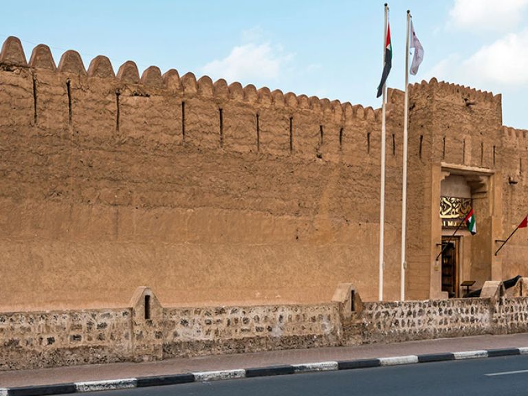Al Fahidi Fort, Dubai's oldest building from 1787, is now the Dubai Museum, reflecting the city's history and culture in the Al Fahidi Historical Neighborhood.
