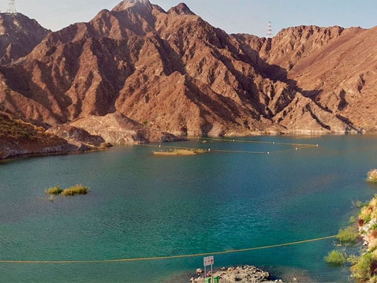 Visit Dubai's Al Rafisah dam for an exhilarating day with friends and family. Enjoy kayaking, scenic hilltop views, and a serene lounge area, ensuring endless excitement.