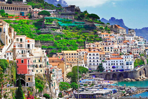Discover the Amalfi Coast's captivating blend of seaside charm and mountain splendor. Embrace the beauty of the Tyrrhenian Sea and Lattari Mountains while exploring quaint towns like Amalfi and the relaxed ambiance of Positano. Experience authentic Italian living amidst breathtaking views.