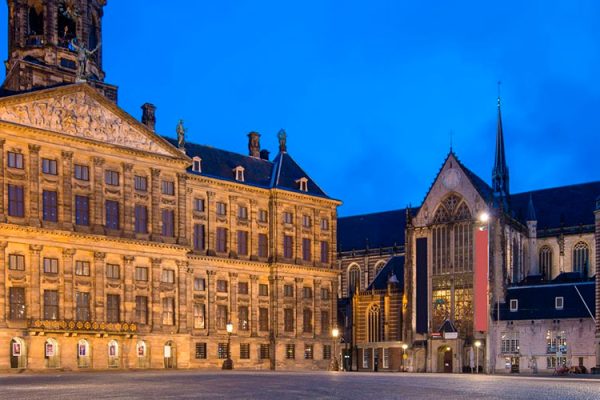 The Amsterdam Royal Palace, or Paleis op de Dam, is a historic building. Originally a city hall in the 17th century, it now serves as a palace for the Dutch royal family. Open for tours, it showcases exhibits on Dutch history and art, including the Dutch Crown jewels.