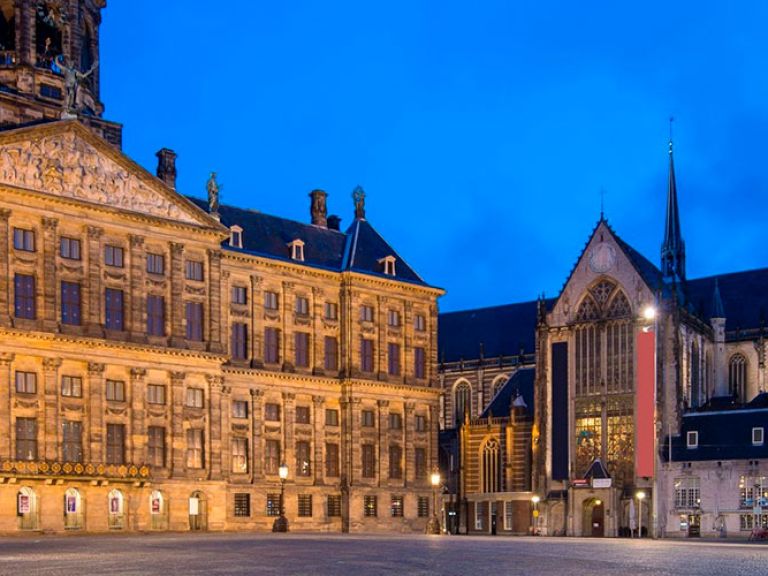 The Amsterdam Royal Palace, or Paleis op de Dam, is a historic building. Originally a city hall in the 17th century, it now serves as a palace for the Dutch royal family. Open for tours, it showcases exhibits on Dutch history and art, including the Dutch Crown jewels.