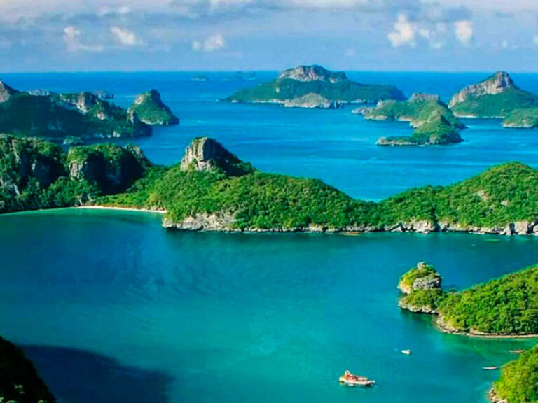 Mu Ko Ang Thong National Marine Park, established in 1980 in Thailand's Surat Thani Province, spans 102 square kilometers across 42 islands. Known for its clear water and coral reefs, the park offers activities like swimming, snorkeling, kayaking, and hiking, making it an ideal vacation spot.