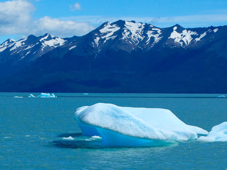 Discover the vast beauty of Argentine Lake, Patagonia's gem. Stretching over 1,400 sq miles, it boasts majestic Andean peaks, pristine shores, and breathtaking wildlife. Penguins, dolphins, and condors add to the enchantment.