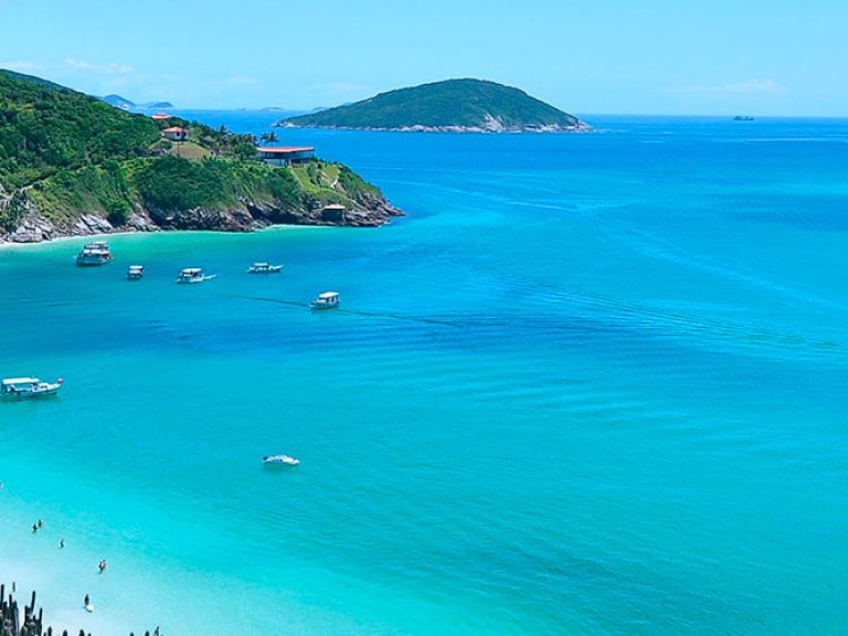 Arraial do Cabo, Brazil, is renowned for clear waters, pristine beaches, and diving. Activities include boat tours, surfing, hiking to Pontal do Atalaia, and winter whale watching.