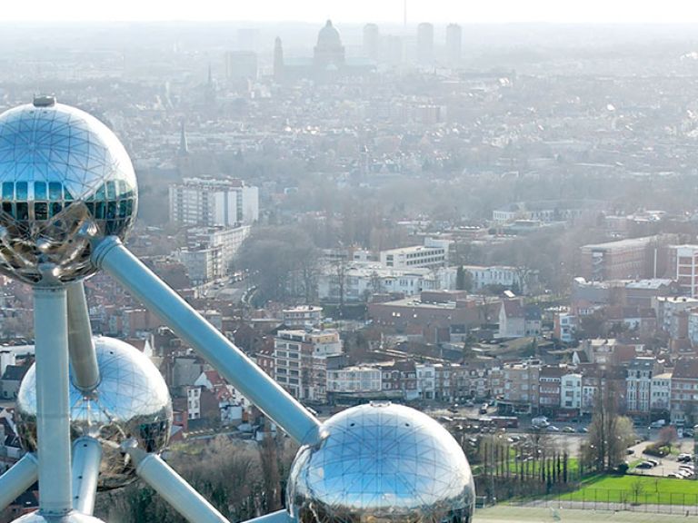 The Atomium, an iconic modernist building, was designed for Expo 58. It features nine steel spheres connected by tubes, offering exhibits and stunning views. A must-visit attraction in Brussels!