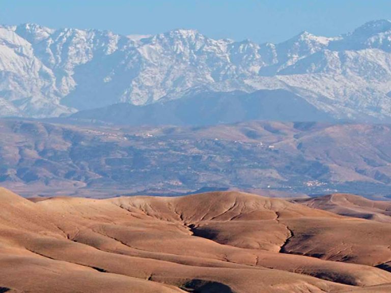 The Agafay Desert near Marrakech, Morocco, offers stunning landscapes with canyons, plains, and stony hillsides. Ever-changing light conditions and vibrant sunsets make this desert a remarkable destination worth exploring.