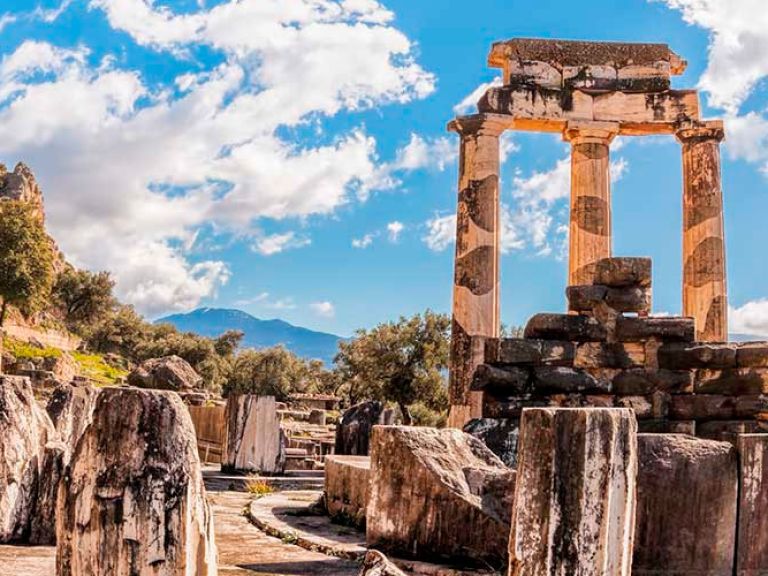 Perched atop Mount Parnassus, Delphi overlooks Greece's Corinth Gulf. Famous for its ancient oracle and Apollo's sanctuary, today it's a beloved tourist destination, providing a unique glimpse into Greece's past.