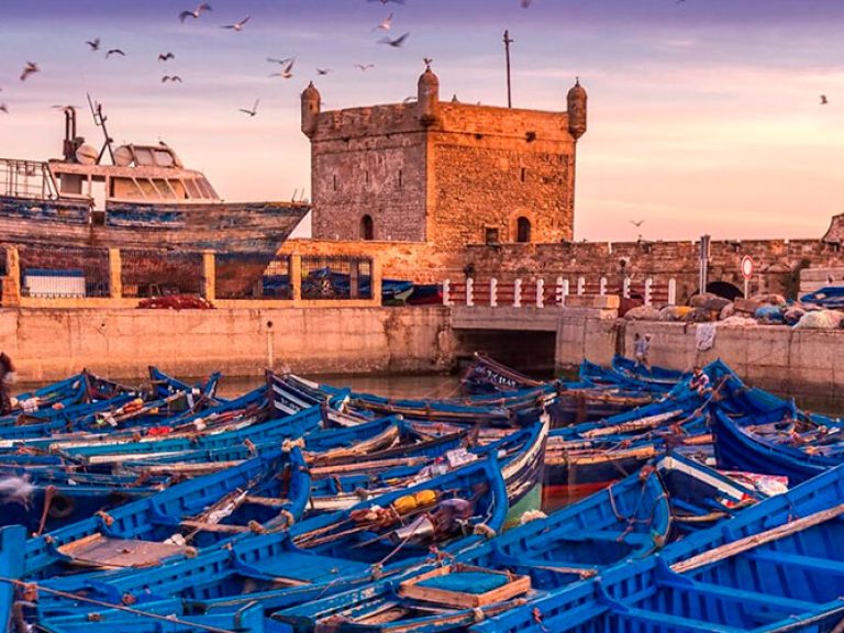 Attractions-in-Essaouira: Essaouira, located on the Atlantic coast, was a key fishing port in the 1900s. It retains its authenticity, offering visitors a glimpse of a traditional Moroccan fishing village, and is renowned for its UNESCO-listed charming medina.