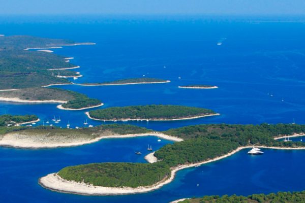 Attractions-in-Pakleni-Islands: Explore the breathtaking Pakleni Islands, a cluster of islets near Hvar, Croatia. With their clear waters, secluded coves, and pristine beaches, these islands are ideal for swimming, sunbathing, and snorkeling. Discover the unspoiled beauty of Croatia on a boat tour through this enchanting archipelago.