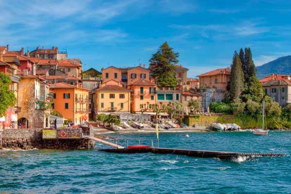Varenna, a picturesque village on Lake Como's eastern side, charms with vibrant houses, cobbled lanes, and stunning lake views. Visitors can explore the Castle of Vezio, dine at waterfront cafes, admire beautiful gardens, or ferry to nearby towns.
