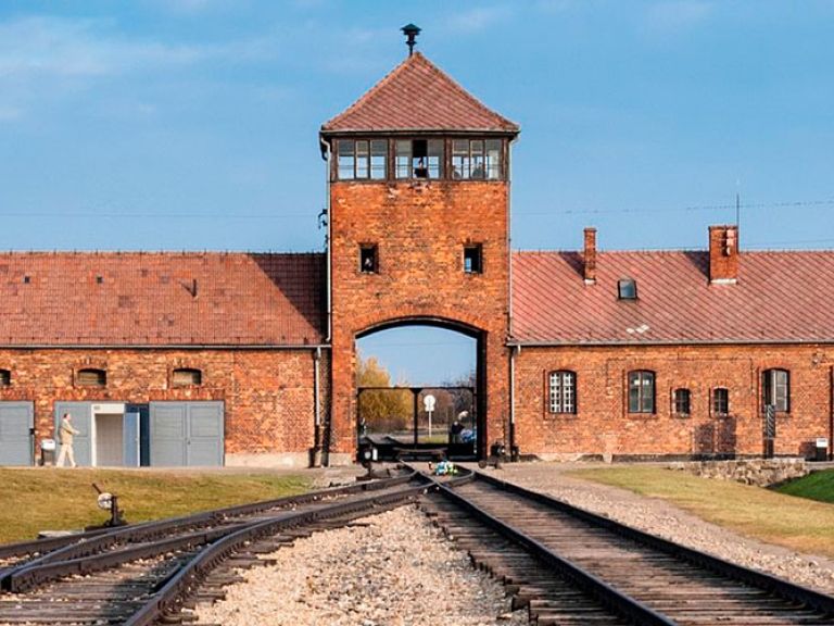 Auschwitz Concentration Camp, or Auschwitz-Birkenau, was a Nazi German complex where 1.1 million people, mostly Jews, perished during World War II. Now a museum and memorial, it stands as a haunting tribute to the Holocaust victims.
