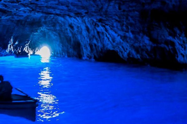 Capri's must-visit Blue Grotto features stunning, sunlight-illuminated blue waters within a sea cave. Accessible by boat, you can marvel at the radiant waters and natural cave formations, promising an unforgettable, mesmerizing experience.