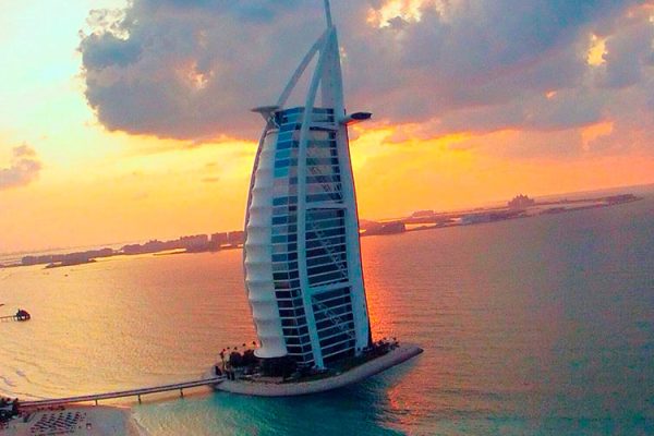 Burj Al Arab in Dubai is an iconic luxury hotel, known for its sail-like design. It offers stunning city and Gulf views, ranking among the world's most luxurious hotels.