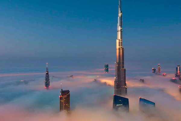 Burj Khalifa in Dubai stands at 829.8 metres, housing over 900 apartments and Armani Hotel. Tourists can explore it with the "At The Top" tour.