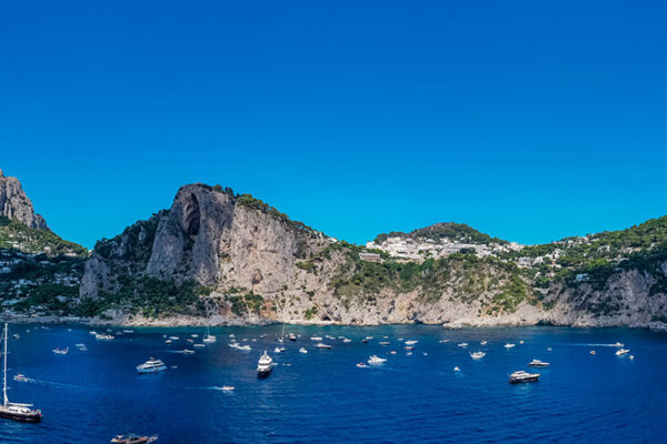Capri is a beautiful island located in the Gulf of Naples. It is known for its dramatic cliffs, stunning coastline and luxury hotels. Anacapri is the highest point on the island and offers panoramic views of the Tyrrhenian Sea.