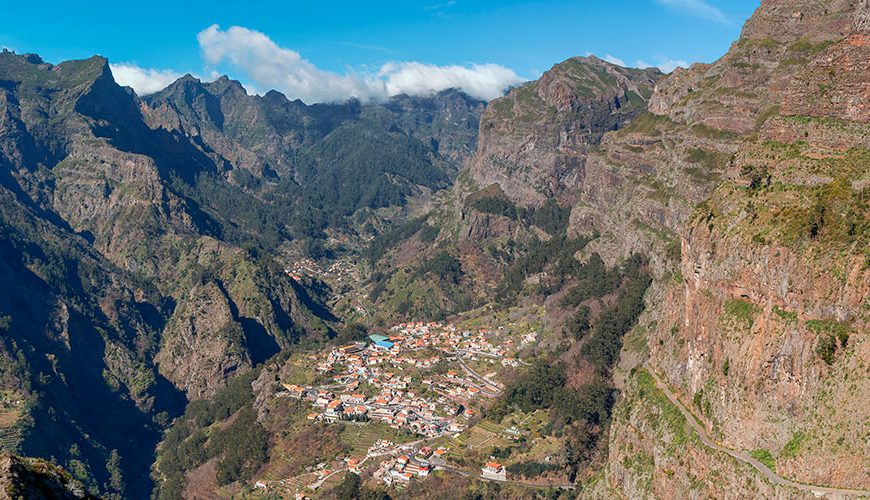 Curral das Freiras is a tiny village located in a valley surrounded by mountains. It's a place of great natural beauty, with lush vegetation and clear waters. The village is home to a small community of farmers and fishermen who live off the land.