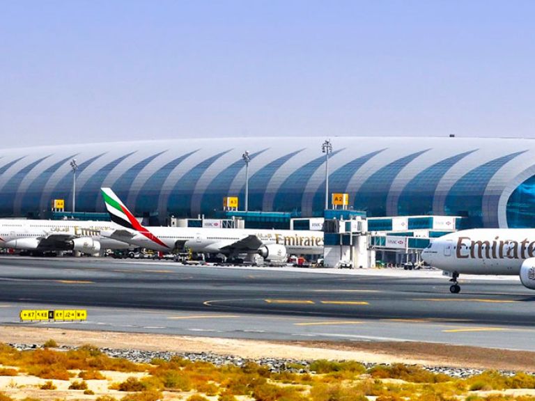 Dubai International Airport (DXB) is one of the busiest airports in the world and serves as a hub for Emirates, flydubai, and Qantas. It's located in the Al Garhoud district, about 4 miles southeast of Dubai's city center.
