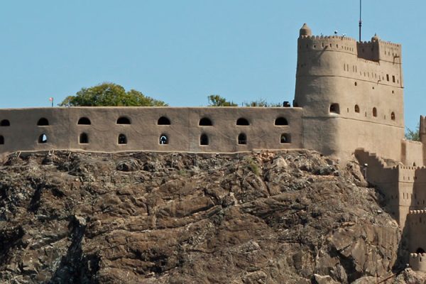 Al-Jalali Fort in Muscat, Oman, built in the 16th century, protected the city from invasions. Situated on a hill, it offers panoramic views and boasts two towers and a central courtyard.