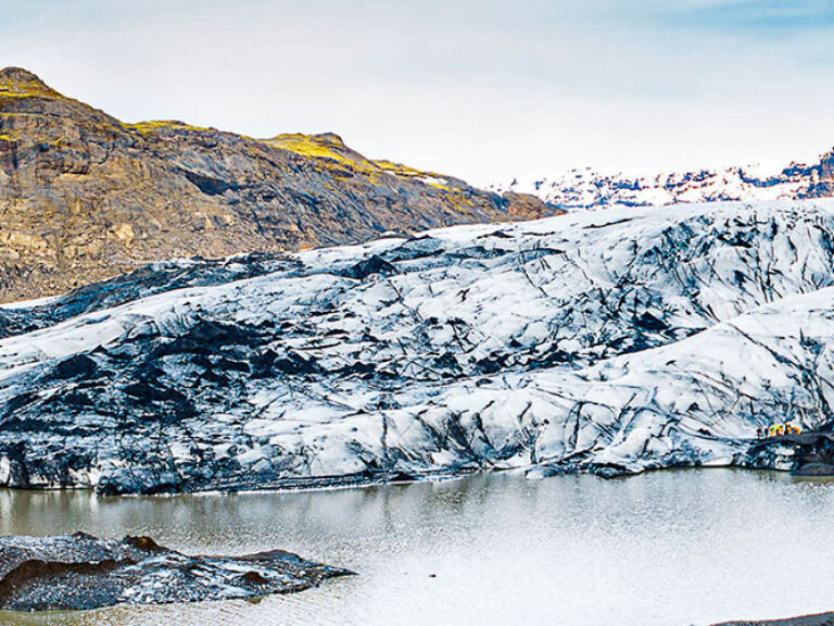 Sólheimajökull Glacier is a glacial tongue and part of the mighty Myrdalsjokull Glacier. With icy crevasses, deep blue colors, and rugged scenery, Sólheimajökull is one of Iceland's most popular glaciers for ice climbing and hiking. Sólheimajökull is easily accessible from the nearby town of Reykjavik and can be reached by a short drive or even a hike.