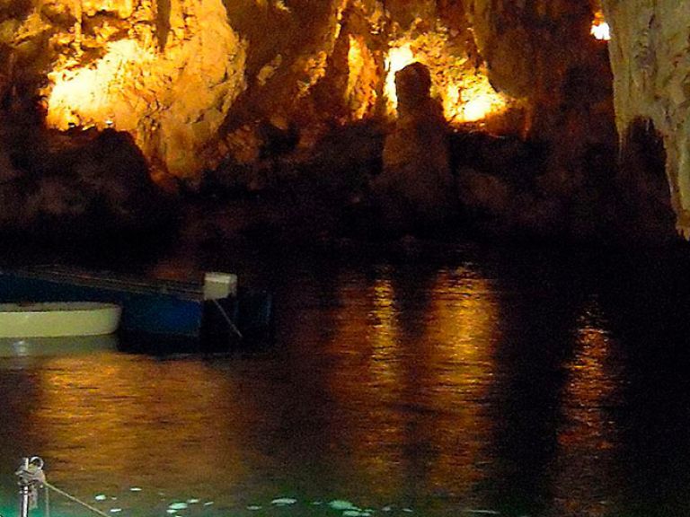 Discover the Emerald Grotto, or Grotta dello Smeraldo, in Conca dei Marini, near Amalfi. This charming village lies on the stunning Amalfi Coast, renowned for its cliffs, pristine waters, and picturesque villages. Don't miss this captivating destination!