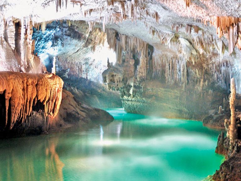 Nestled 18 km north of Beirut, Jeita Grotto is a captivating marvel. Crystal-clear waters weave through limestone caves adorned with mesmerizing rock formations, making it a top tourist hotspot in Lebanon. The site comprises upper and lower galleries.