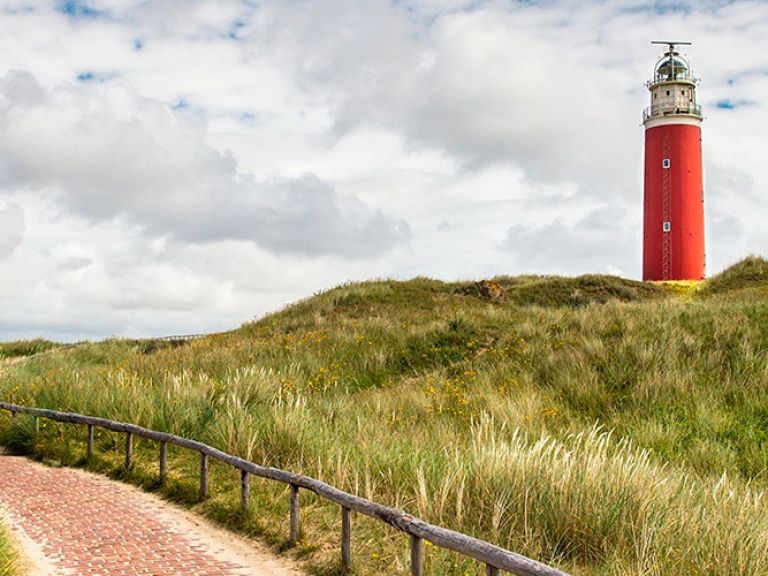 Discover the captivating Lighthouse Texel, a historic beacon on the northern tip of the Dutch island. Standing 55 meters tall, it's a must-visit attraction.