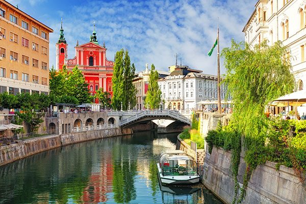 Ljubljana, Slovenia's green capital, showcases the architectural genius of Jože Plečnik. He's the force behind the city's Baroque skyline, notably the iconic Triple Bridge. Plečnik's influence also extends to the National and University Library, as well as the scenic riverside market.