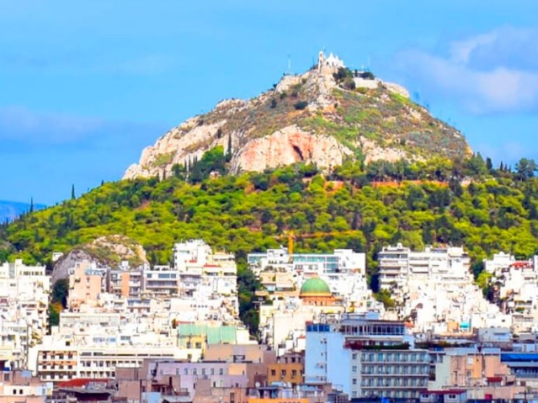 Lycabettus Hill, or Lykavittos, is a famous attraction in Athens. Standing at 277 meters tall, it offers stunning panoramic views, attracting both locals and tourists.