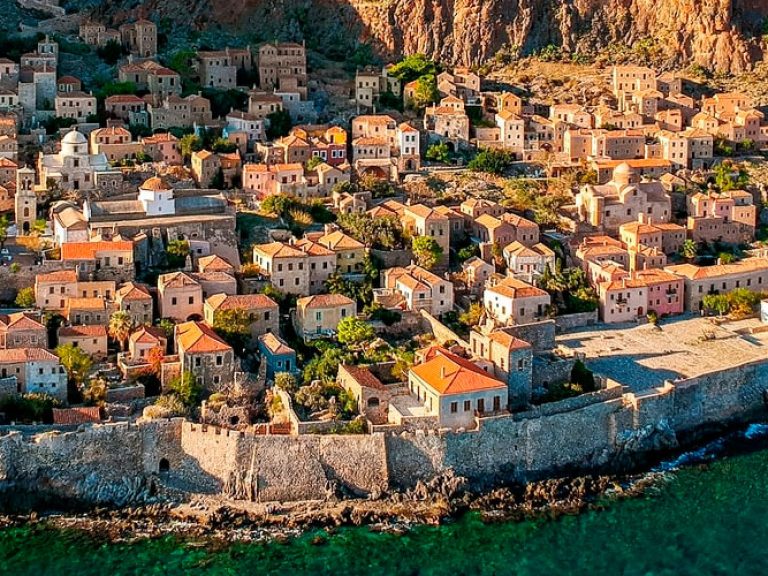 Step back in time at Monemvasia Castle, a remarkable medieval fortress perched on a cliff overlooking the sea. Stroll along its cobblestone streets, and marvel at the well-preserved Byzantine-era buildings.