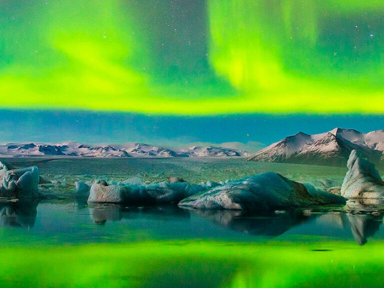 The Northern Lights, visible in Iceland between September and April, are breathtaking displays of colorful lights caused by charged solar particles entering the earth's atmosphere. Iceland is an exceptional location for this natural phenomenon.