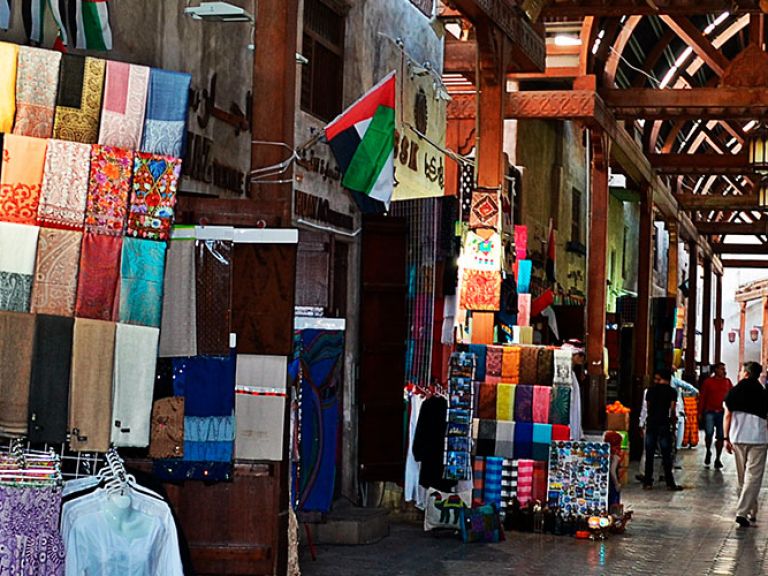 Dubai's Old Souk, also called Textile Souk or Bur Dubai Souk, holds cultural significance. With diverse stalls, it offers an authentic Middle Eastern encounter and a glimpse into Dubai's finest.